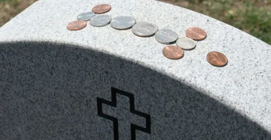 Meaning Behind the Tradition of Coins on Gravestones