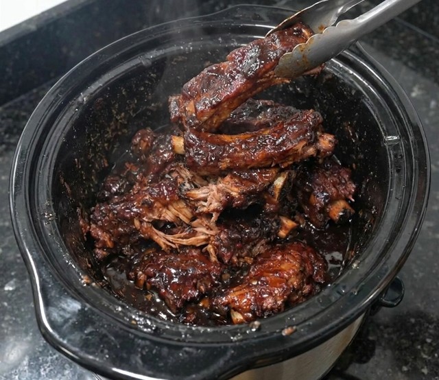 Sticky beef short ribs caramelized under the broiler with glossy sauce