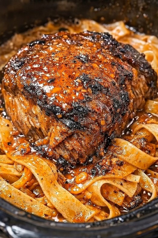 Slow cooked beef pappardelle with fork tender roast and rich silky sauce