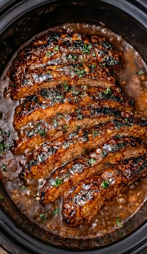 Honey garlic beef brisket with caramelized onions gravy and fresh thyme